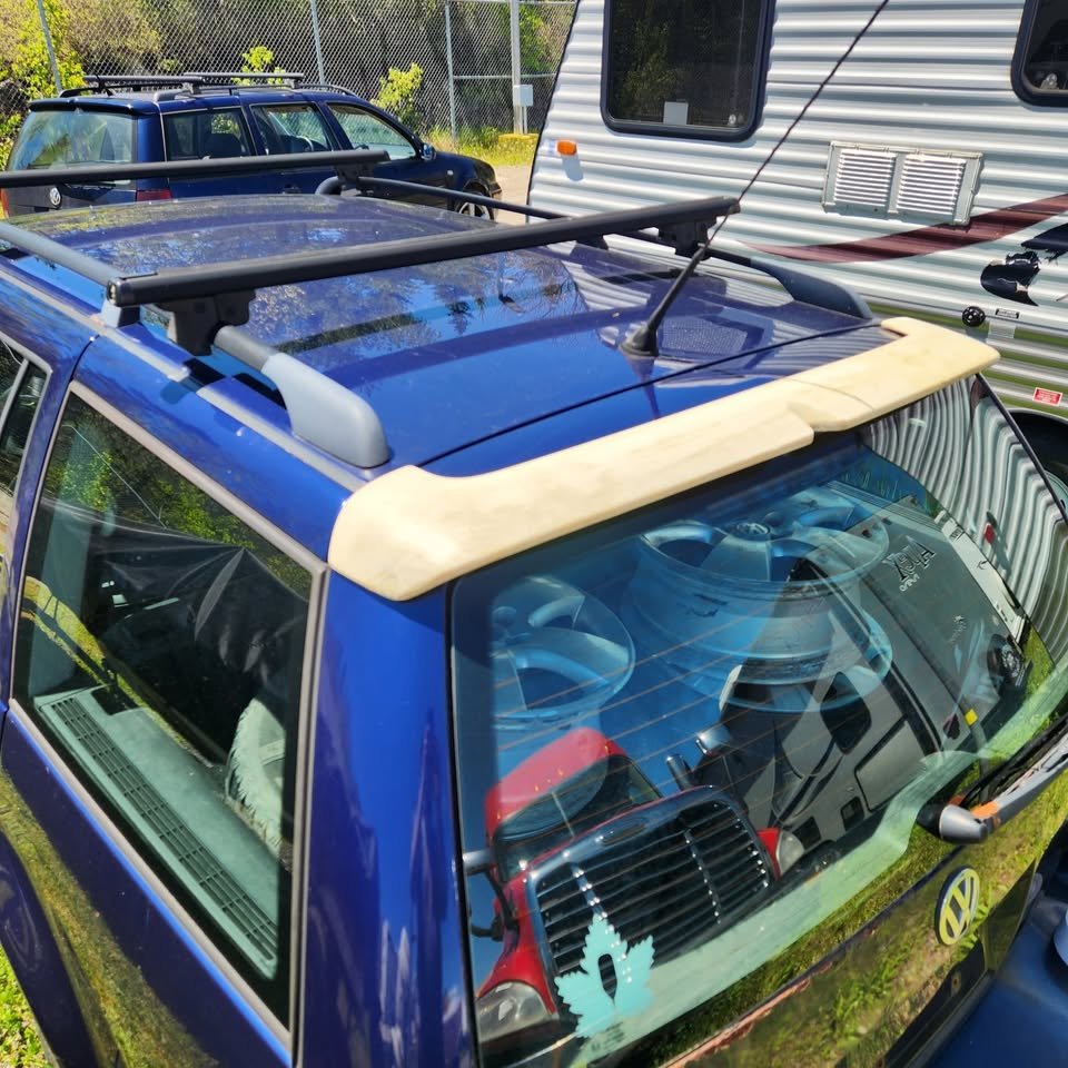 Volkswagen MK4 wagon with OEM-style rear hatch spoiler - three-quarter installed view